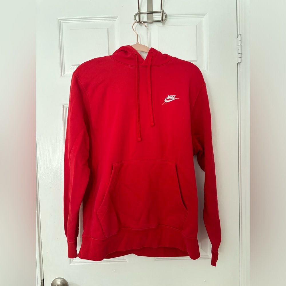 Red Nike hoodie.